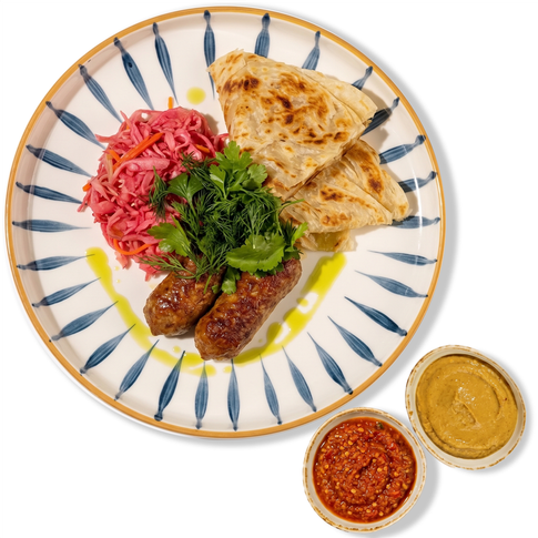 Мясные колбаски с квашеной капустой