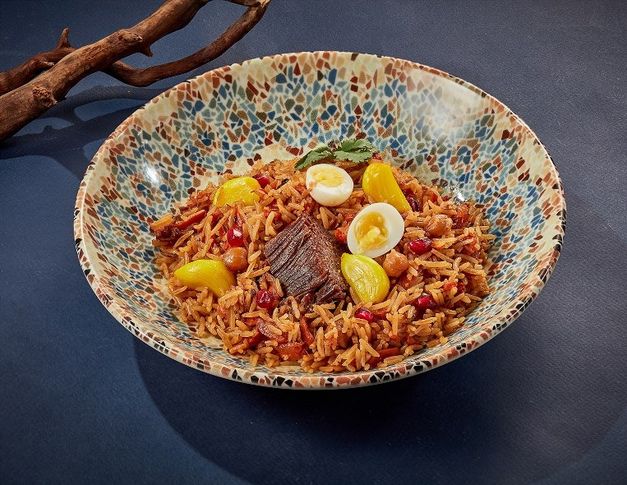 Плов Киш Миш с печеным чесноком и гранатом